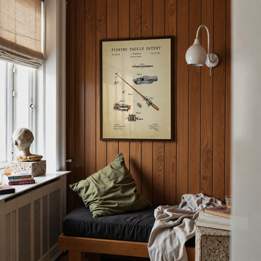 Fishing tackle patent print framed above a bed in a bedroom