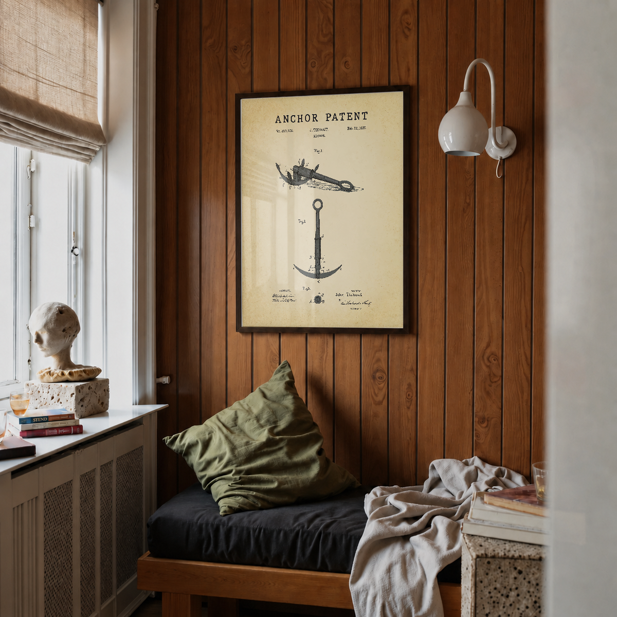 Anchor patent print framed above a bed in a bedroom