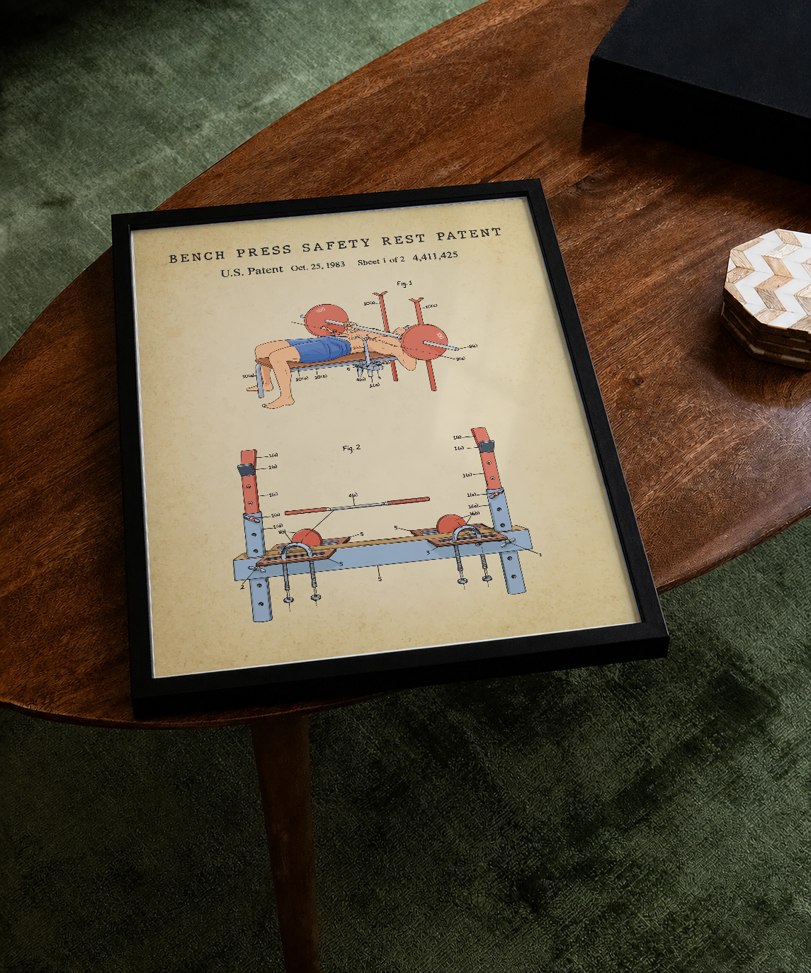 Bench press safety rest patent print displayed on a tabletop
