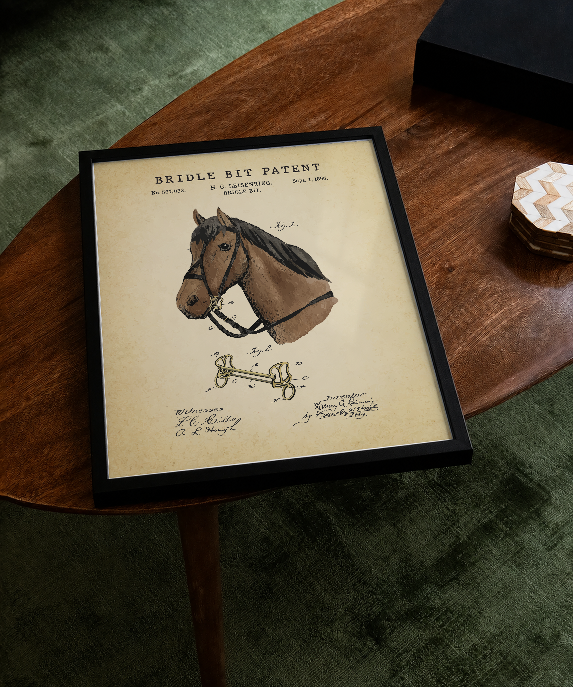 Bridle bit patent print displayed on a tabletop