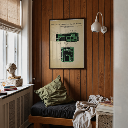 Computer graphics card patent print framed above a bed in a bedroom