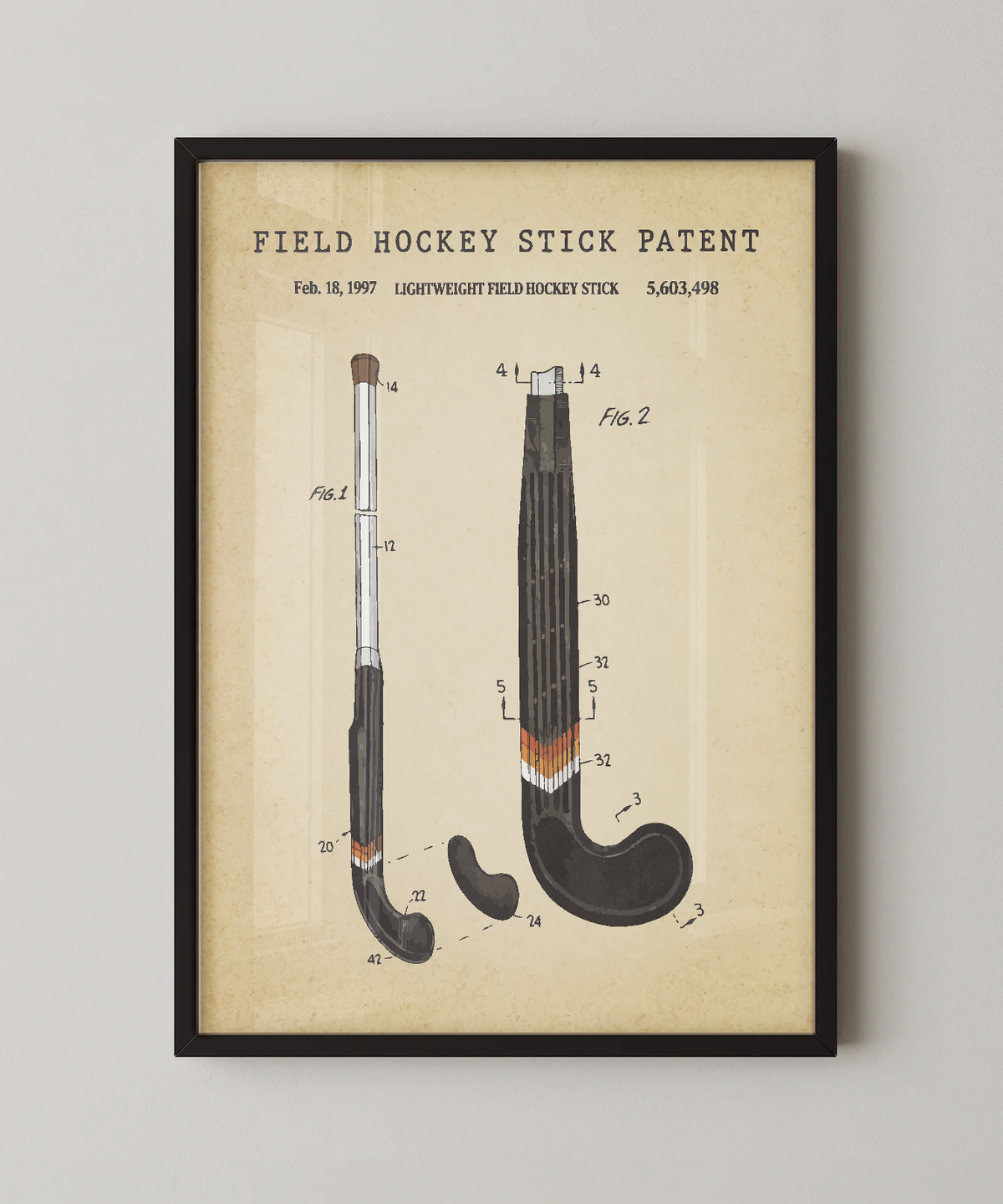 Field hockey stick patent print in a black frame