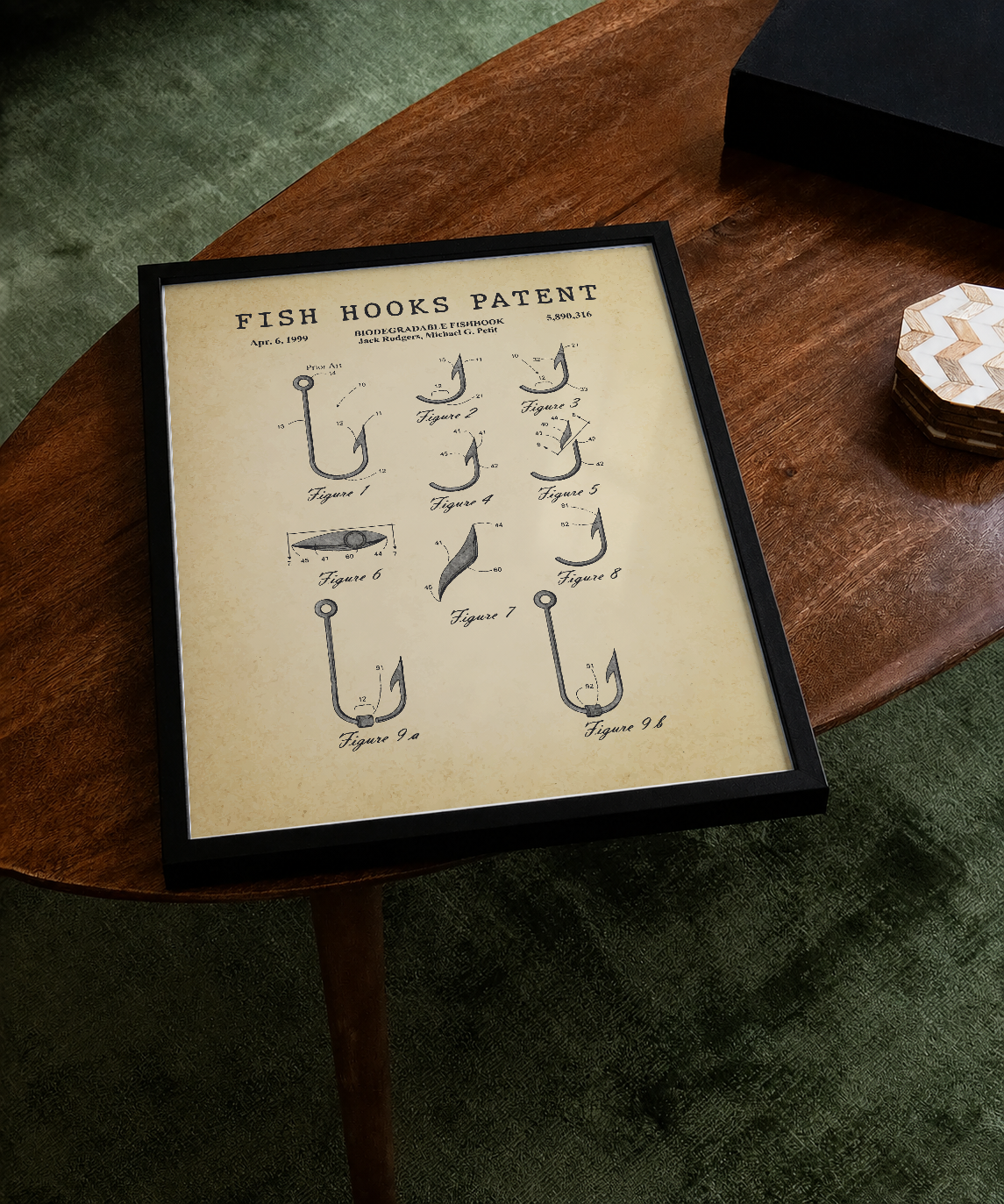 Fish hooks patent print displayed on a tabletop