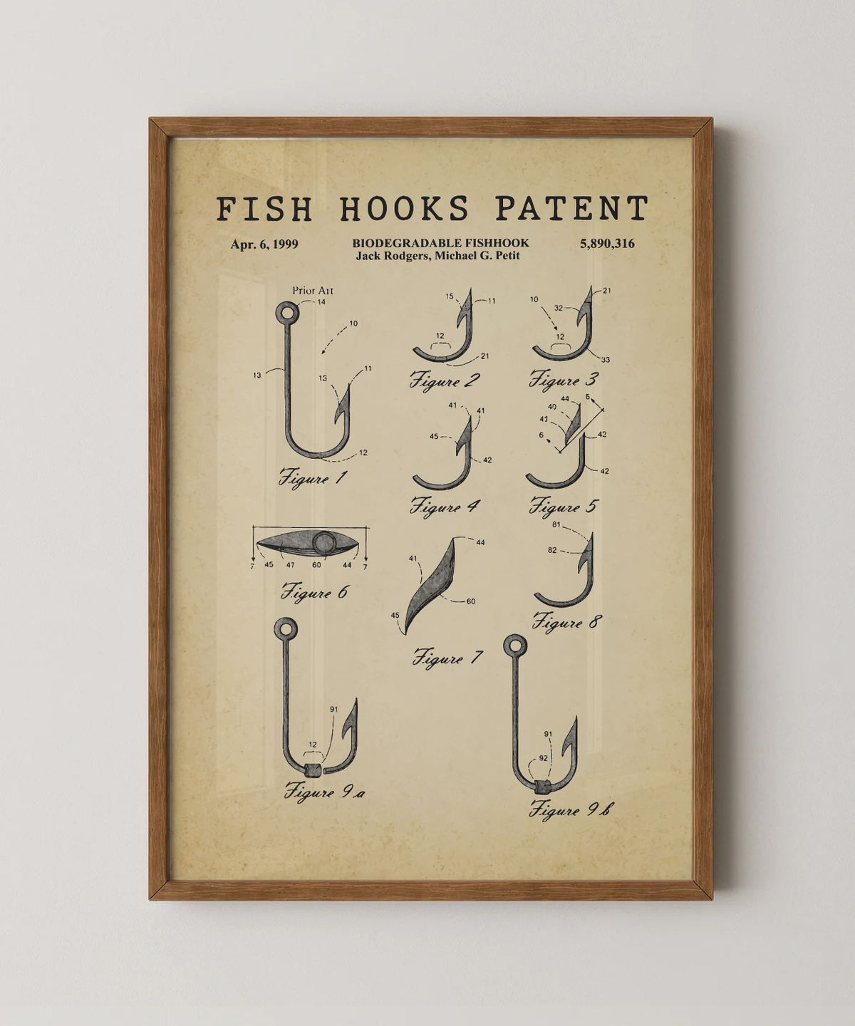 Fish hooks patent print in a natural oak wood frame