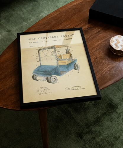 Blue golf cart patent print displayed on a tabletop