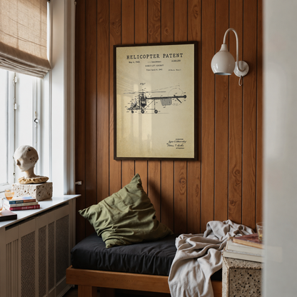 Helicopter patent print framed above a bed in a bedroom