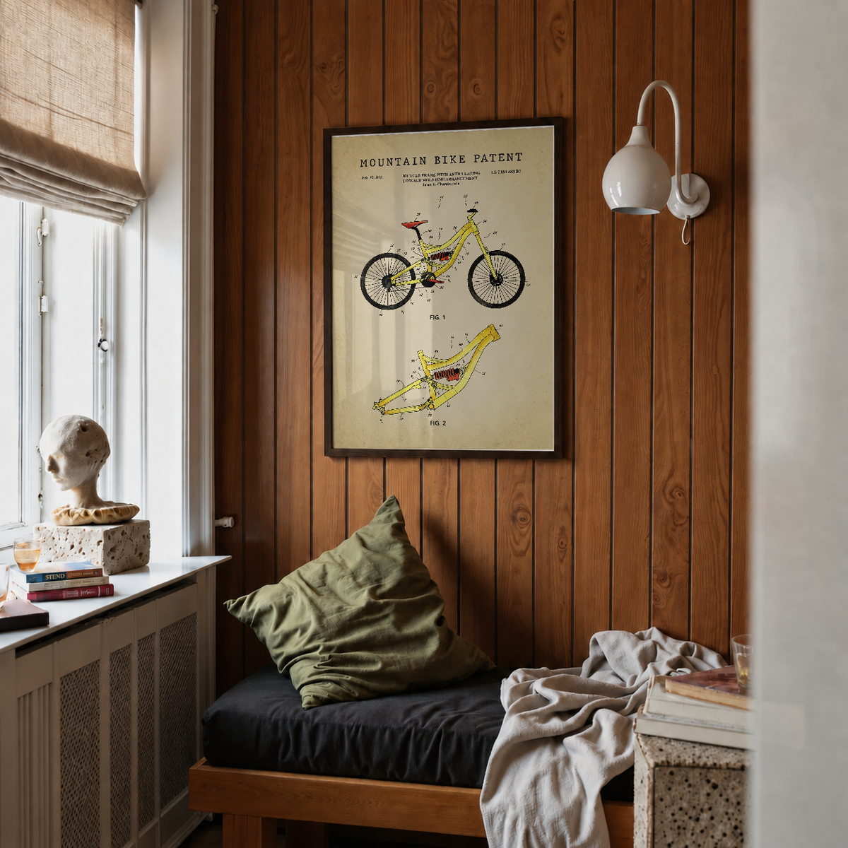 Mountain bike patent print framed above a bed in a bedroom
