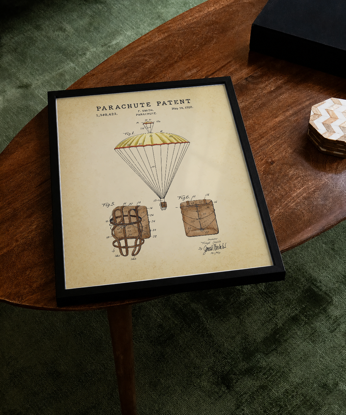 Parachute patent print displayed on a tabletop