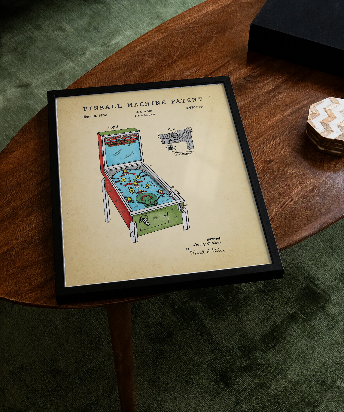 Pinball machine patent print displayed on a tabletop
