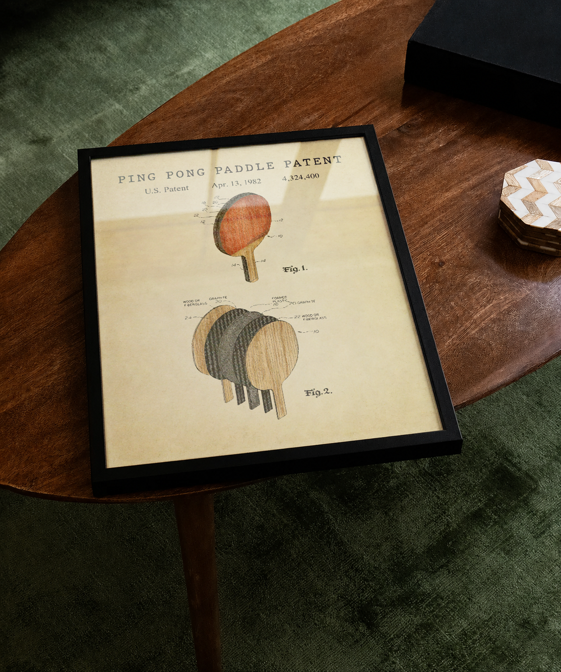 Ping pong paddle patent print displayed on a tabletop
