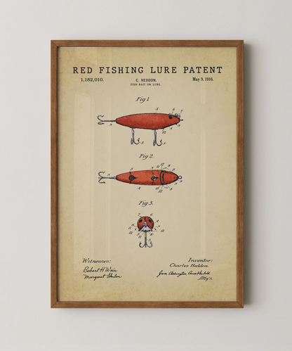Red fishing lure patent print in a natural oak wood frame