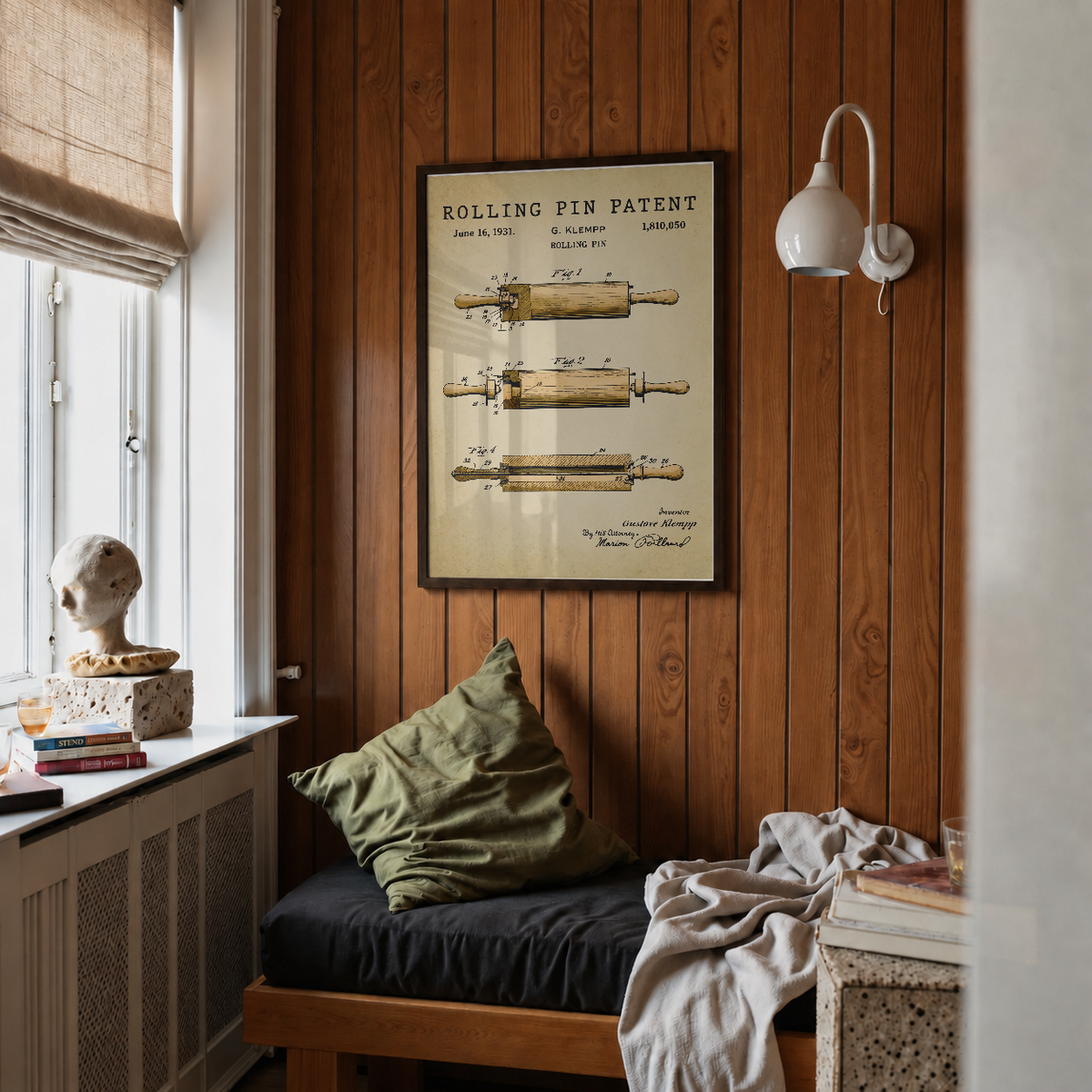 Rolling pin patent print framed above a bed in a bedroom