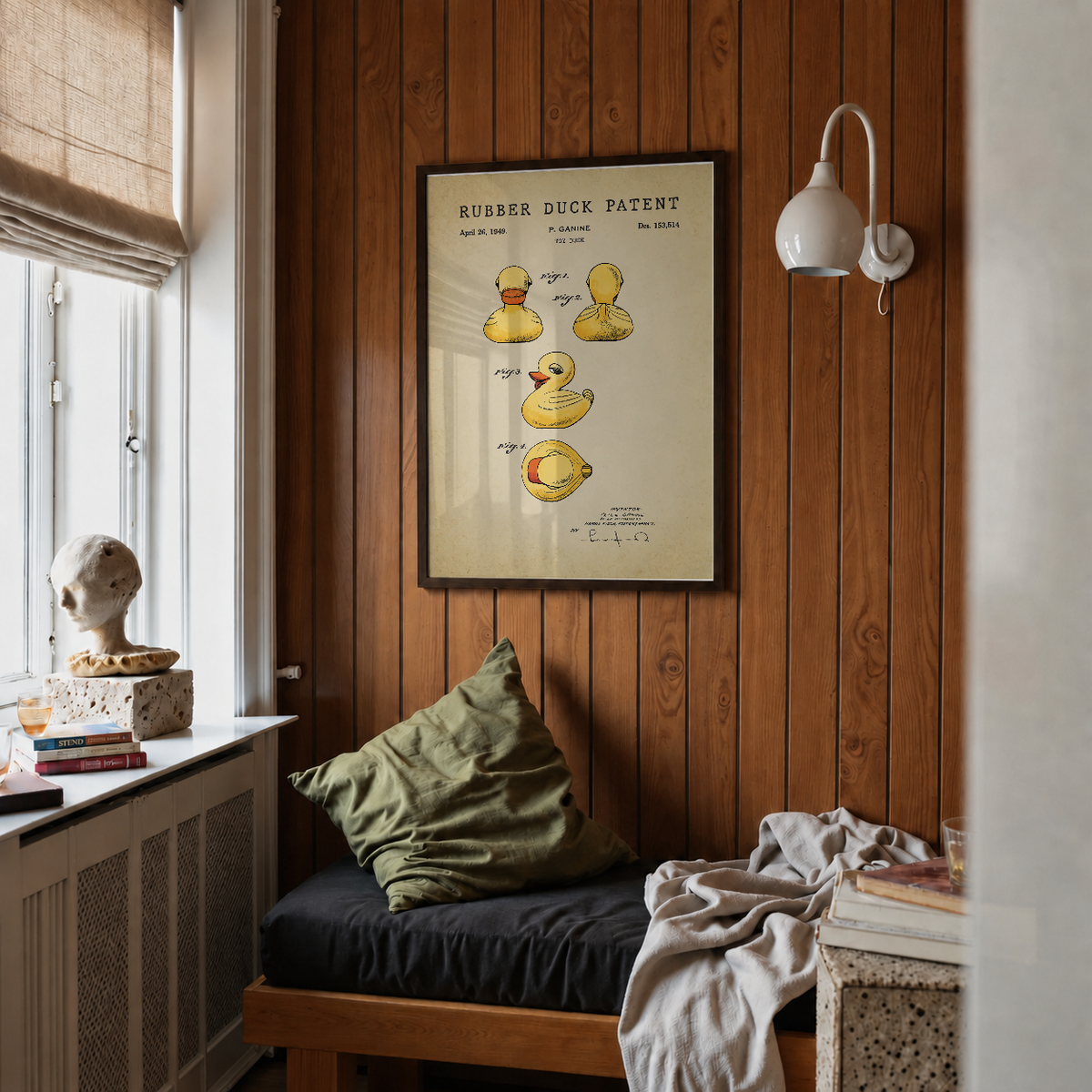 Rubber duck patent print framed above a bed in a bedroom