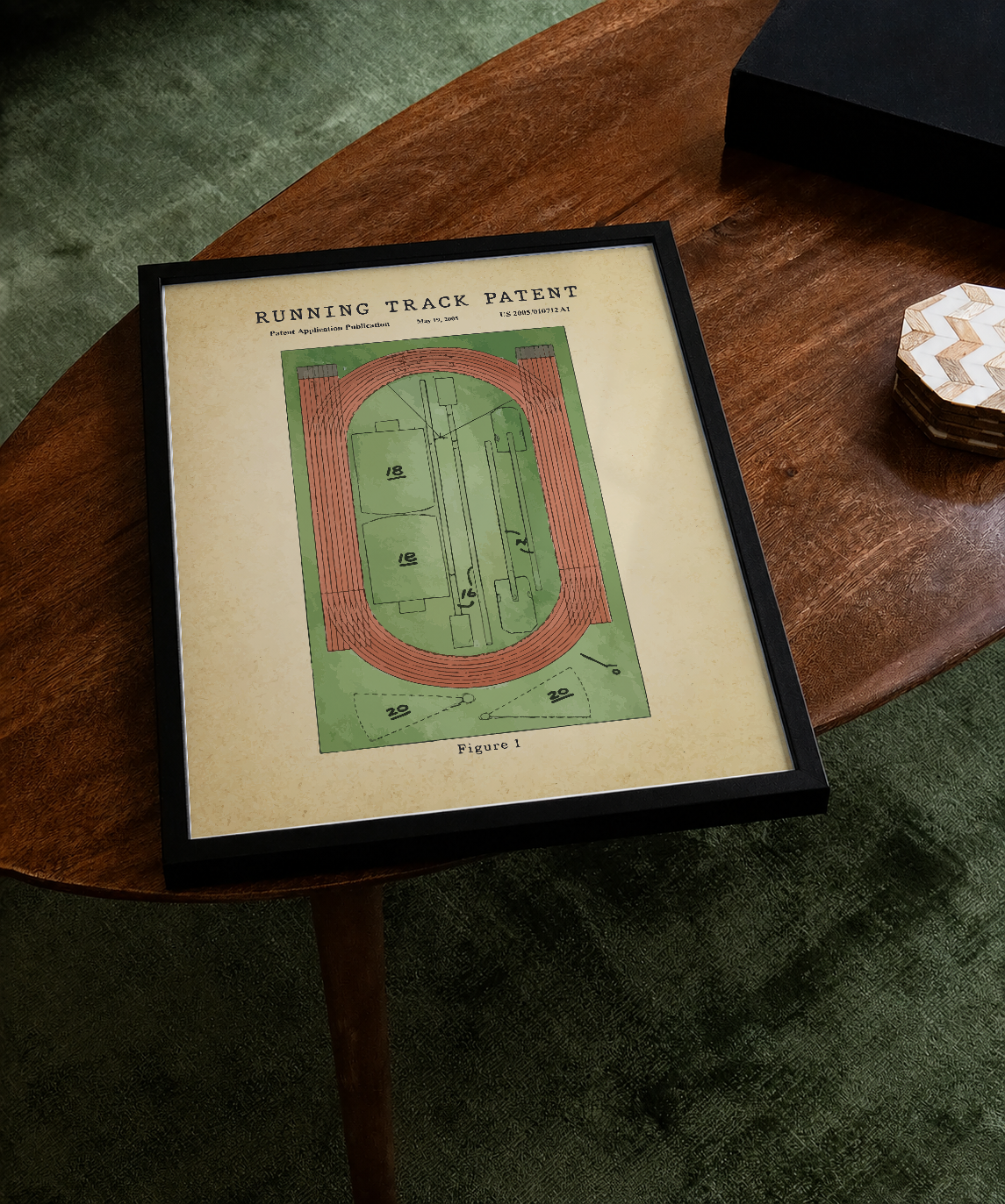 Running track patent print displayed on a tabletop