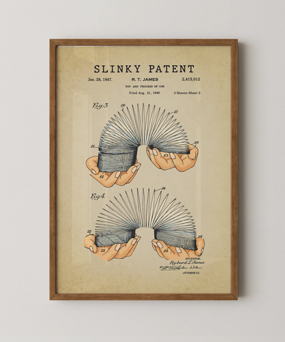 Slinky patent print in a natural oak wood frame