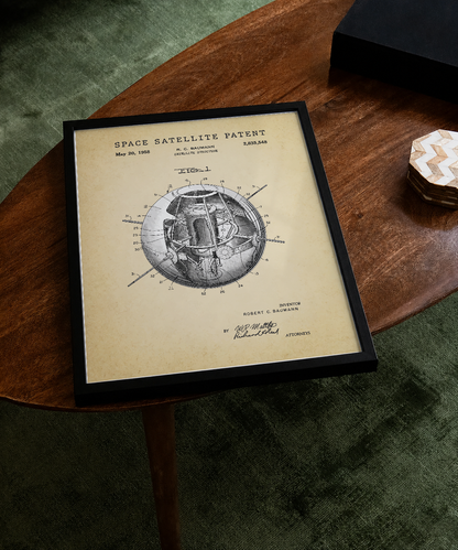 Space satellite patent print displayed on a tabletop
