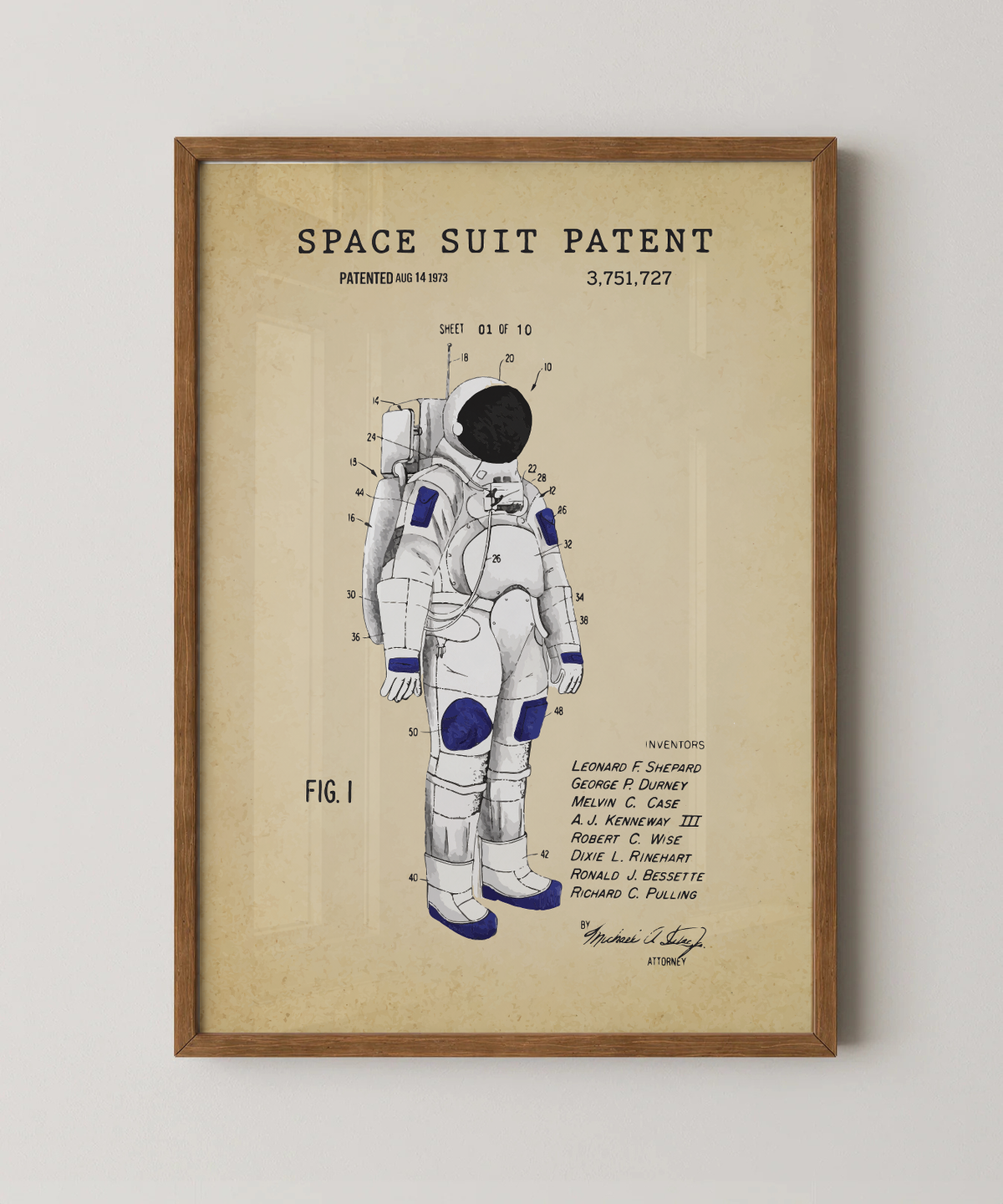 Space suit patent print in a natural oak wood frame