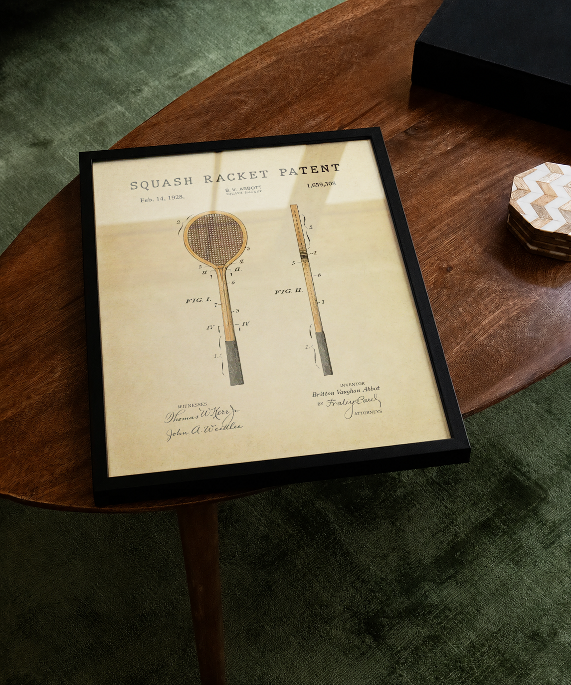 Squash racket patent print displayed on a tabletop