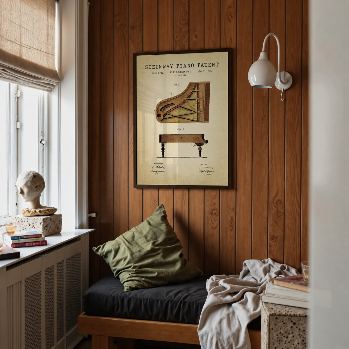 Steinway piano patent print framed above a bed in a bedroom