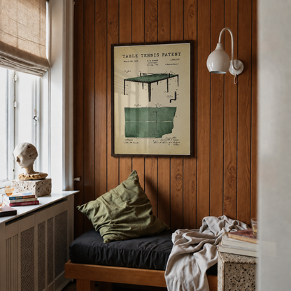 Table tennis patent print framed above a bed in a bedroom