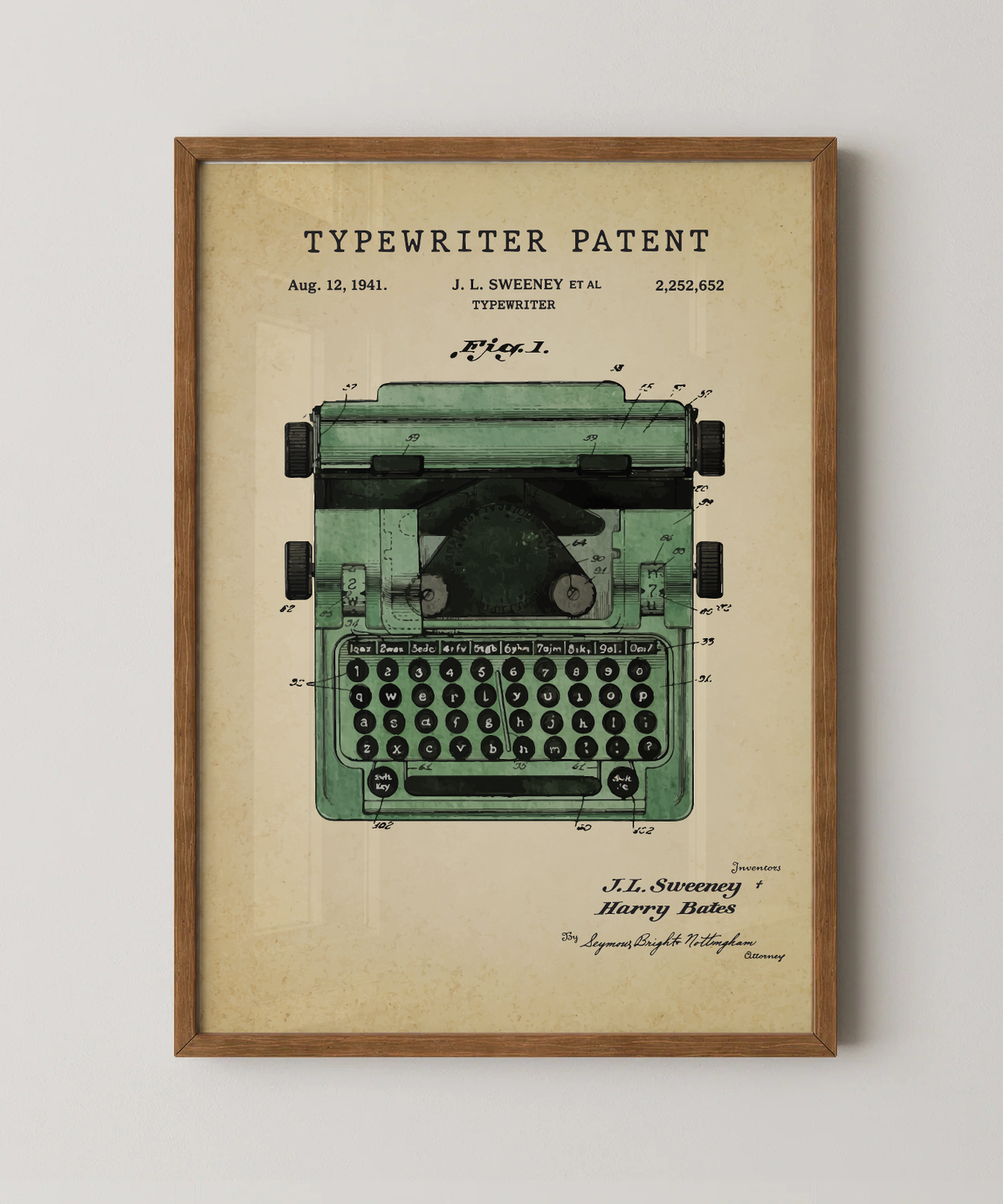 Typewriter patent print in a natural oak wood frame