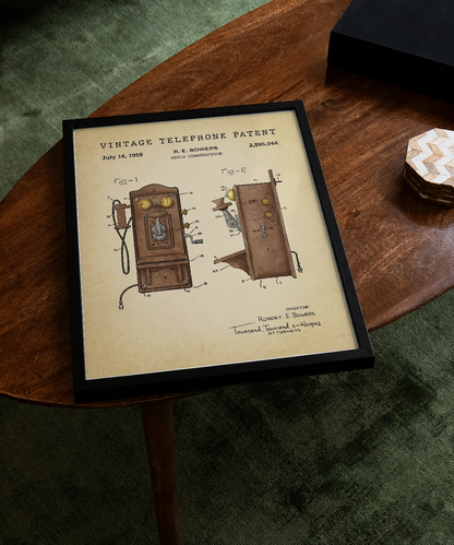 Vintage telephone patent print displayed on a tabletop