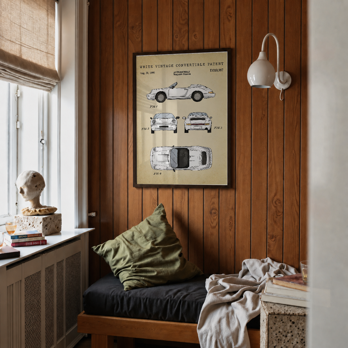 White vintage convertible patent print framed above a bed in a bedroom